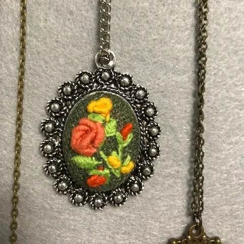 The Kardelens Fiber Arts Group is a talented group of Turkish artisan immigrants living in the Pittsburgh area. The Turkish word “kardelens” is the name of a flower that symbolizes resilience. Their work features embroidered jewelry, greeting cards, and pouches, marbled art fans and more. According to group coordinator Serap: “Through our art projects we became aware that we can have a place in the community and we gained our self-confidence again, like we had in our country. We hope to support other newcomers as we have been supported by the Pittsburgh community.”