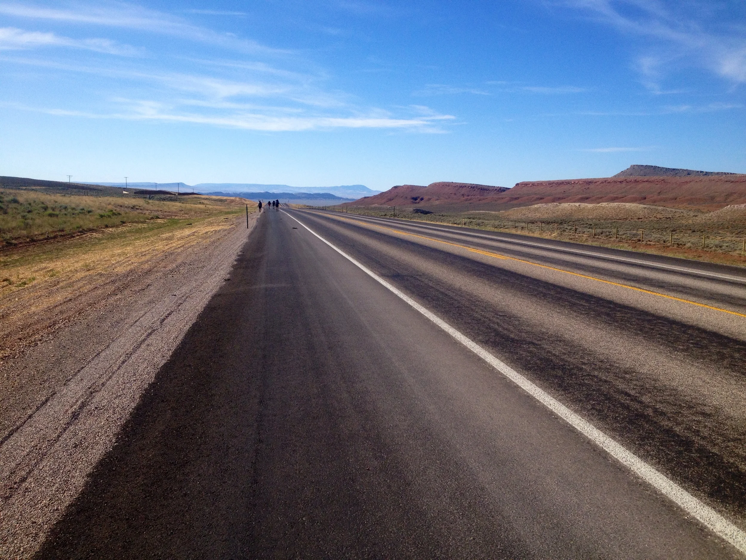 Analog, Wantsum, Chimp and Tootsie headed down the road north of Rawlins, WY.