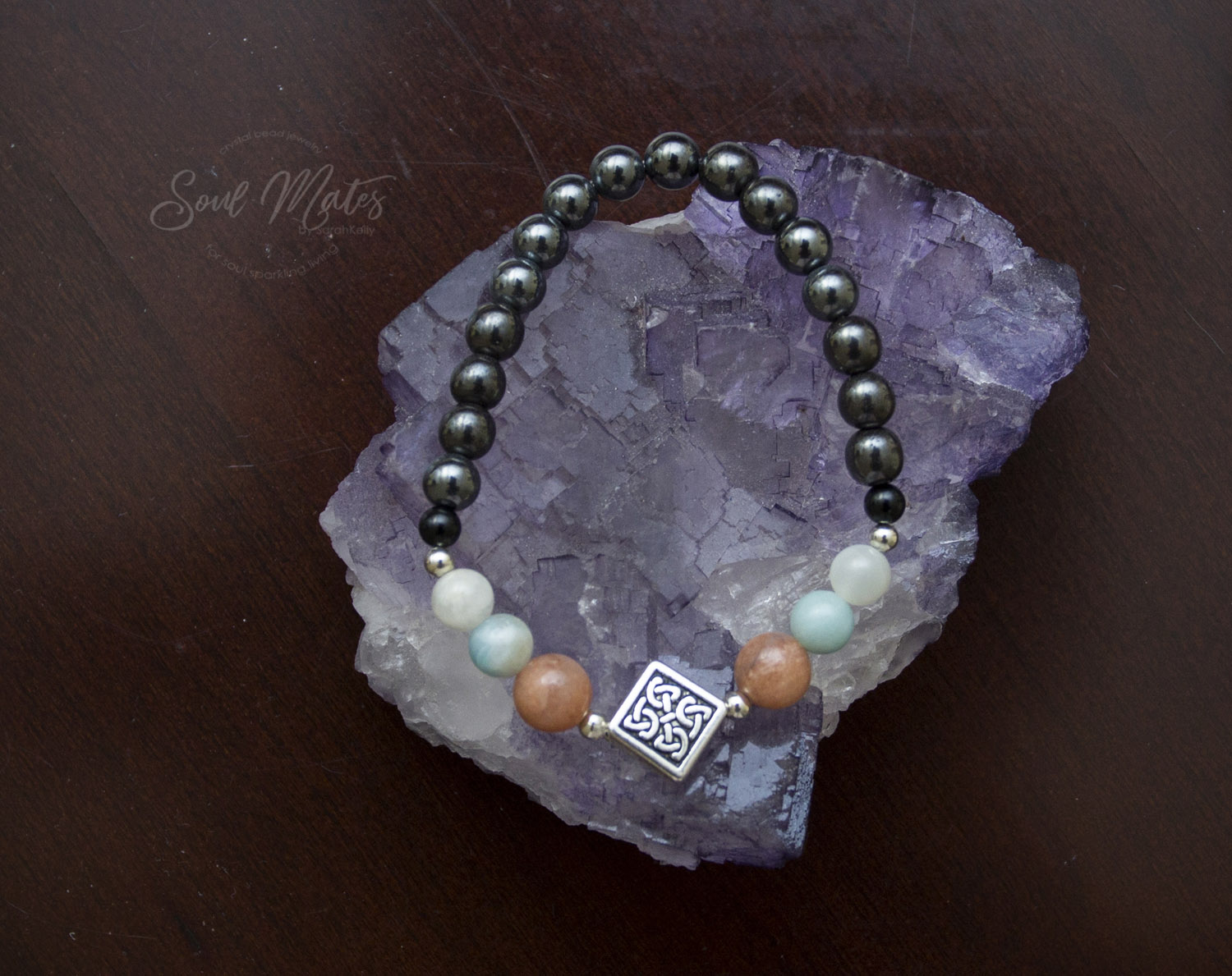 Focus - Great for the workday. Grounding Hematite, soothing Amazonite and creativity inspiring Peach Aventurine. $20