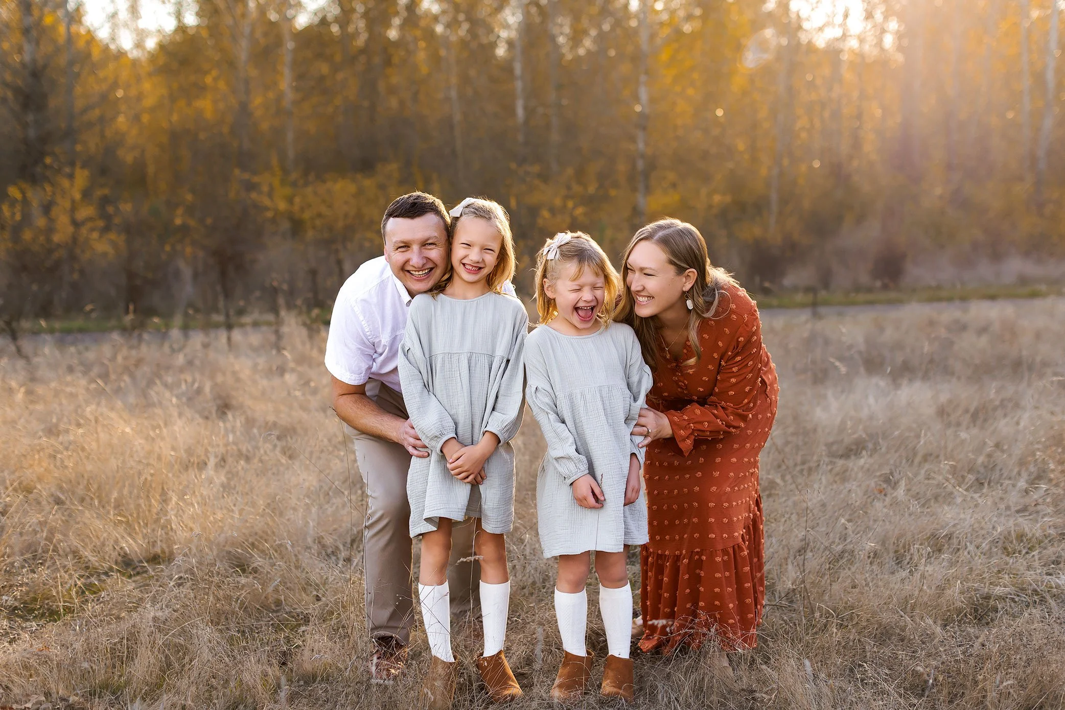 10 Creative Family of Four Poses + Prompts for Natural, Connected Family Photos