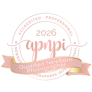 APNPI Qualified Newborn Photographer 2026 accreditation badge for professional newborn photography