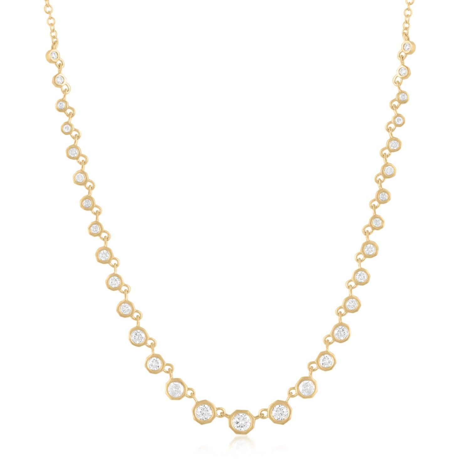 A closer view of a 14K yellow gold necklace composed of graduated octagons, each flush-set with a diamond, hanging from cable chain.