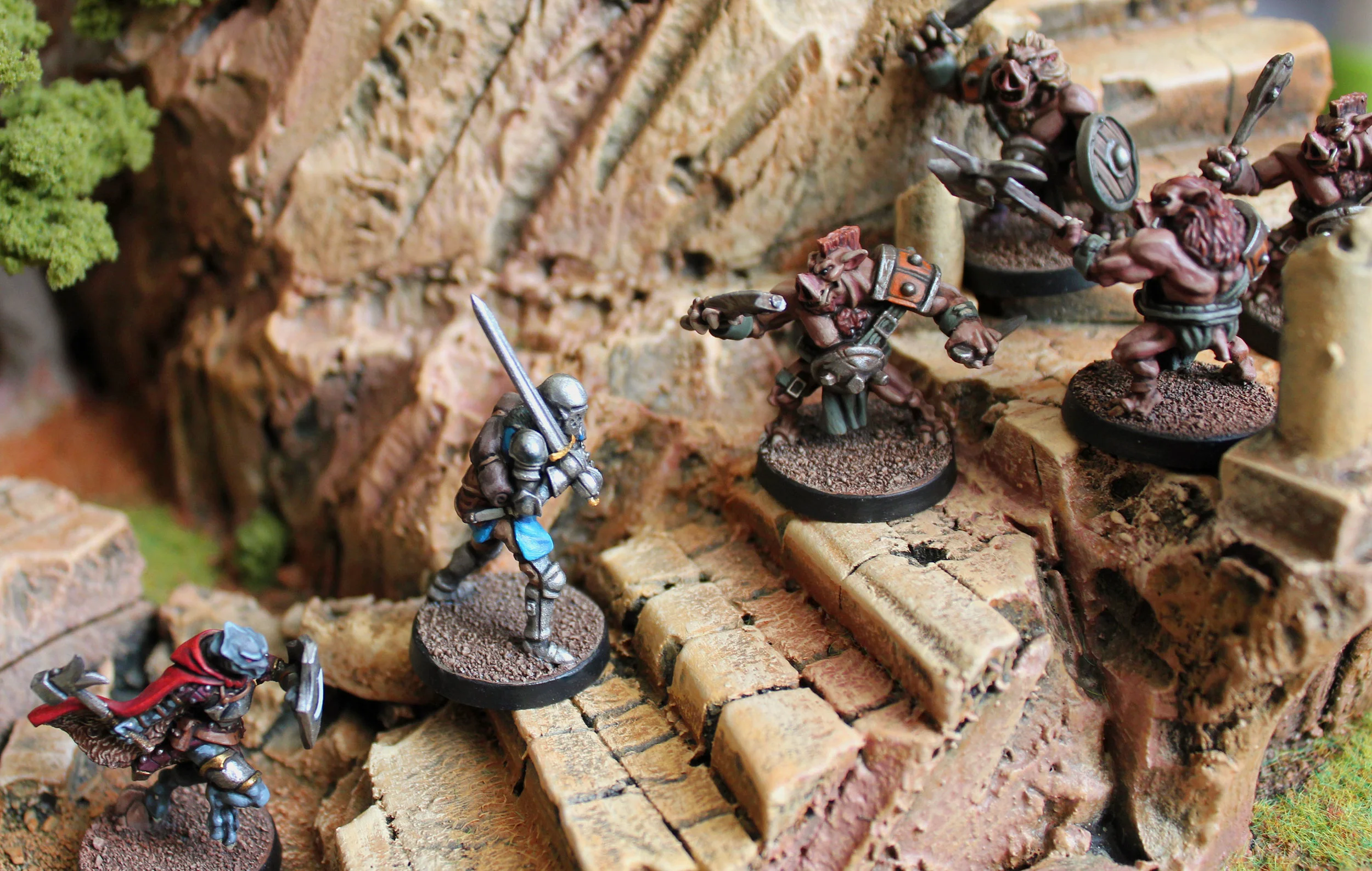 A jolly band of pig men defend the acropolis against a couple of greedy sheeple. Let's hope they have cheese in their pockets.