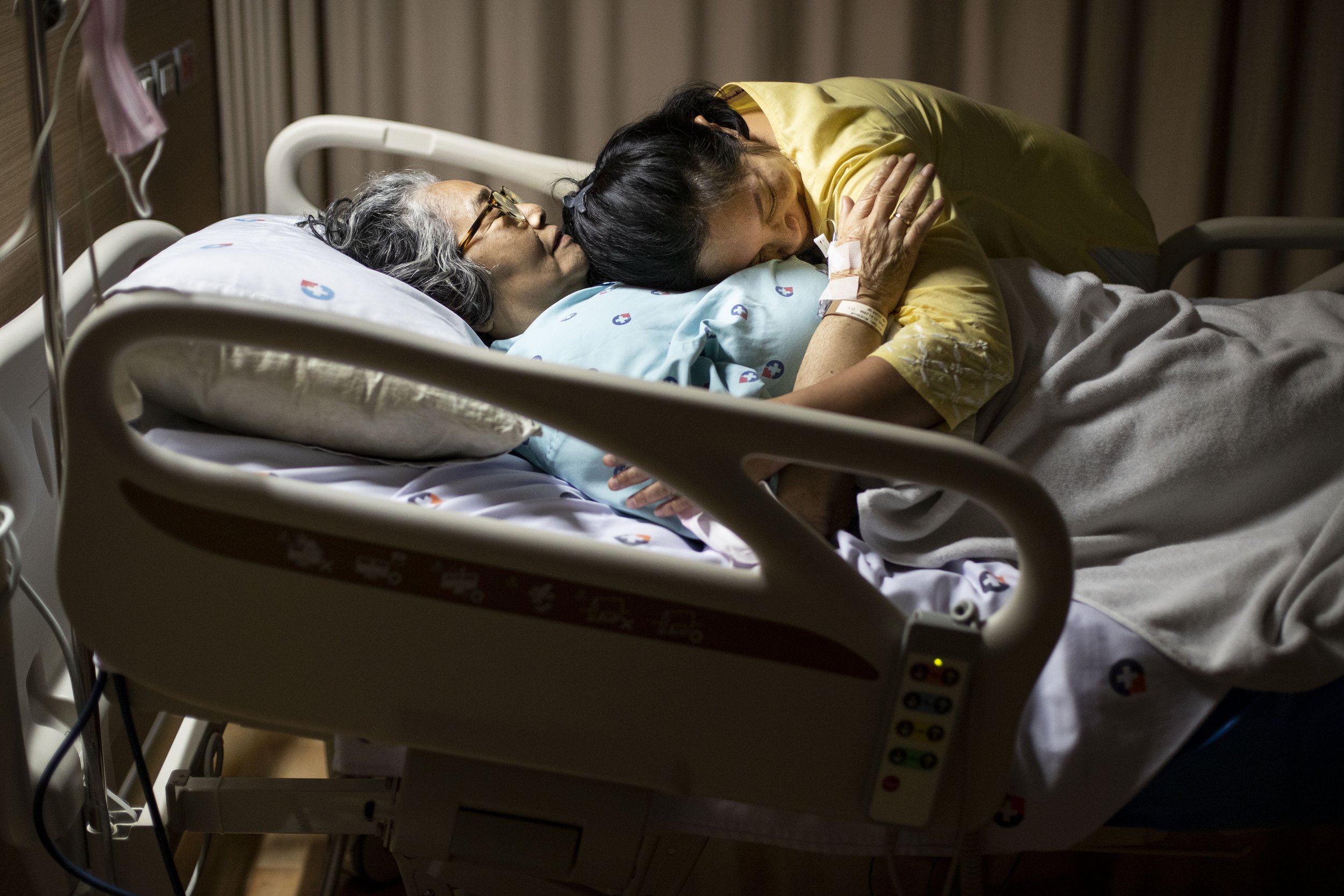  (right) Chutatip “Nok” Suntaranon hugs her mother Kalaya Suntaranon while she was hospitalized in Trang, Thailand on Saturday, April 16, 2022.  "My mother's name is Kalaya, which means beautiful lady," Nok said. "She is the most beautiful lady I eve