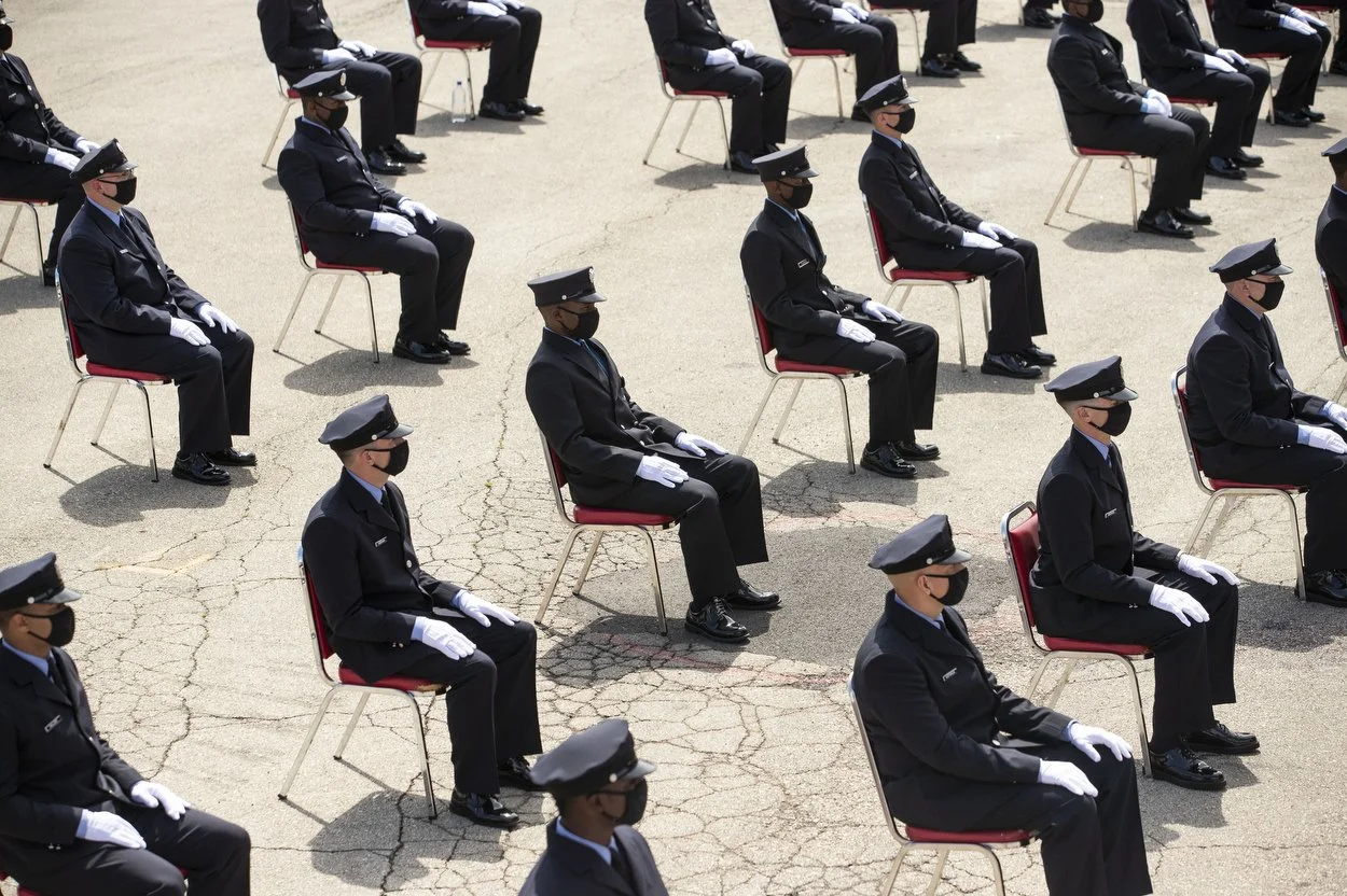  Seats for cadets were spread apart for social distancing during a graduation of 64 members of Class 197 at the Philadelphia Fire Academy in Philadelphia, Pa. on Monday, July 13, 2020.  