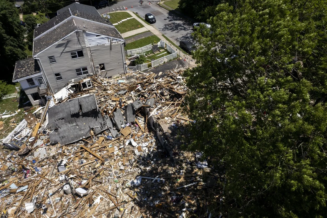  Debris covers the site of an explosion at the corners of Butler Avenue and Hale Street in Pottstown, Pa. on Tuesday, May 31, 2022. Five people were killed in the explosion last Thursday, four children and one adult. As of Tuesday morning, the source