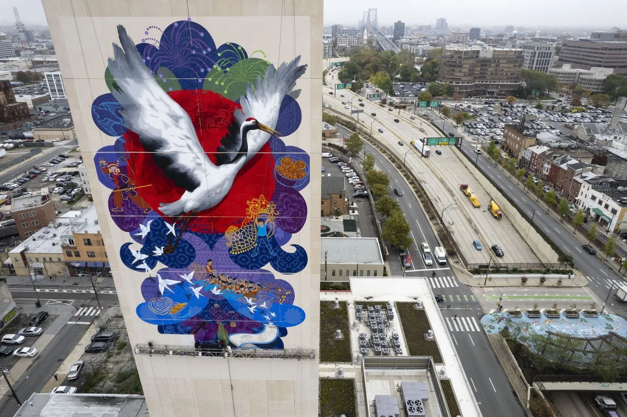  A new mural designed by artist Chenlin Cai, is being installed on the Crane Chinatown building in Philadelphia, Pa. on Monday, October 24, 2022. The collaborative project, from the Philadelphia Chinatown Development Corporation, Mural Arts Philadelp