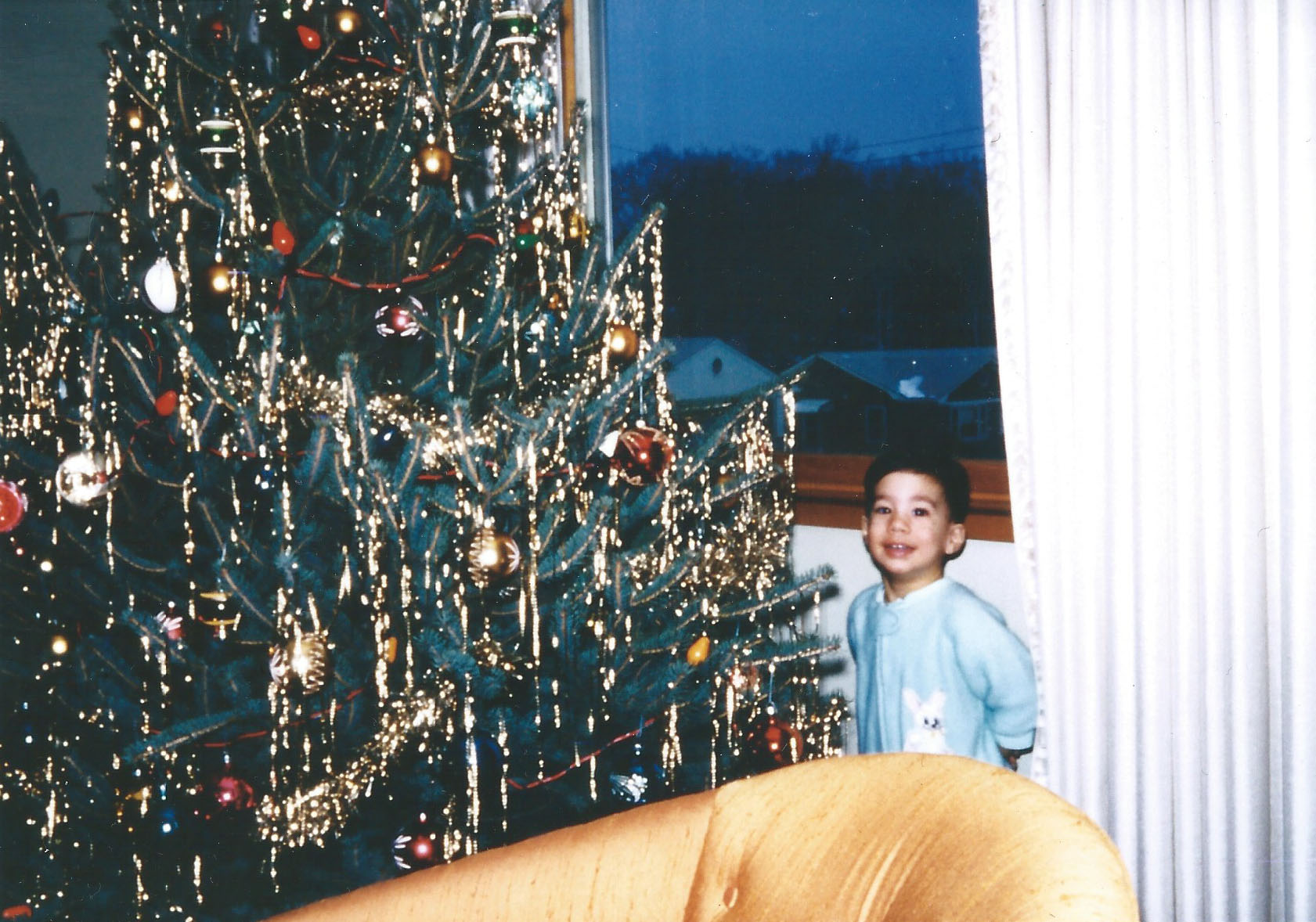me at 2 years old... probably hoping that santa brought Crayola crayons!