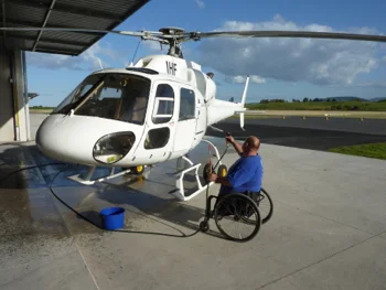 Helping wash John's helicopter at the end of a day of Rena salvage work. 
