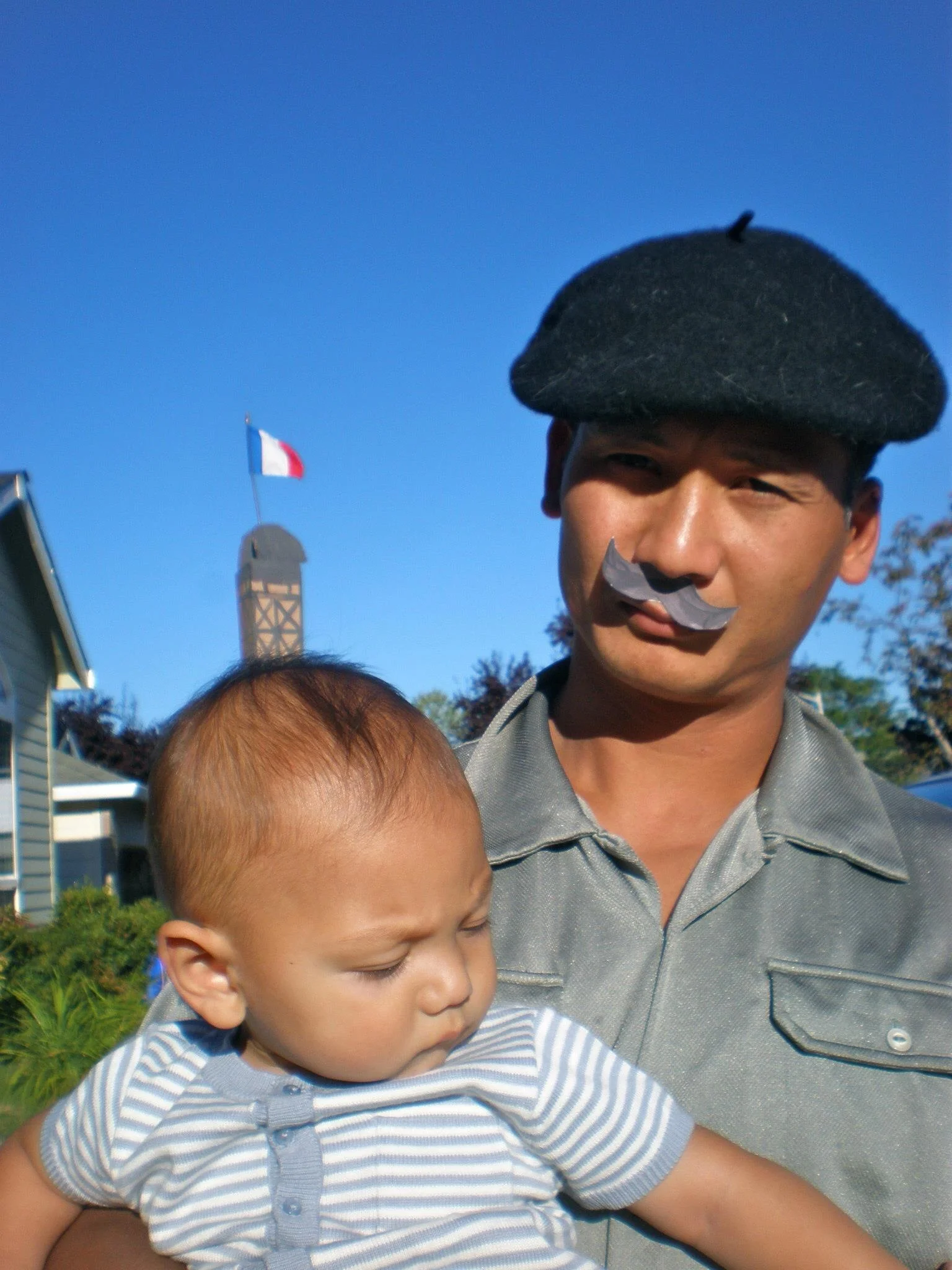 My husband having some French fun with our infant son