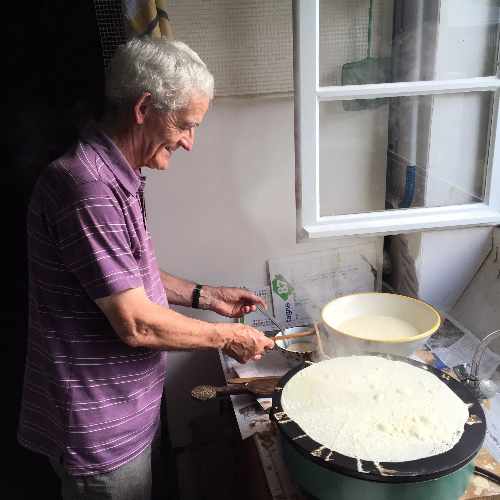 My Breton "papy" making crêpes--it was such a delight to watch him!