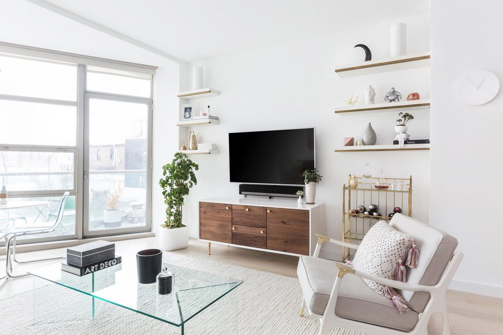 an-nyc-rental-that-looks-straight-out-of-la-floating-shelves-tv-stand-apartment-5a6fa2e2604f27084a0d4a88-w1000_h1000.jpg