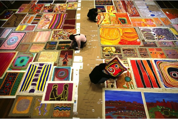 Aboriginal co-curators Louise Mengil, Hayley Atkins and Murungkurr Terry Murray at work, 2008