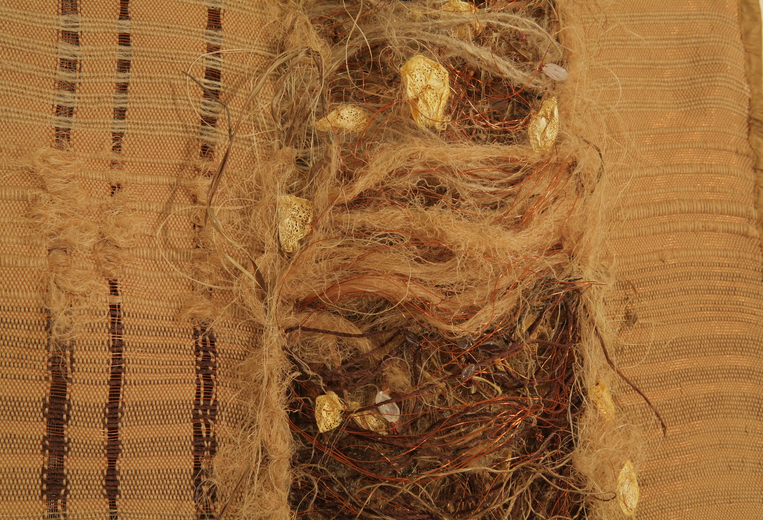 "Bramble:" Bamboo, silk, copper and organic fibre. Handwoven on floor loom. Hand tied and stitched by Shelita Birchett Benash. 2007. 36"x118". 2007.