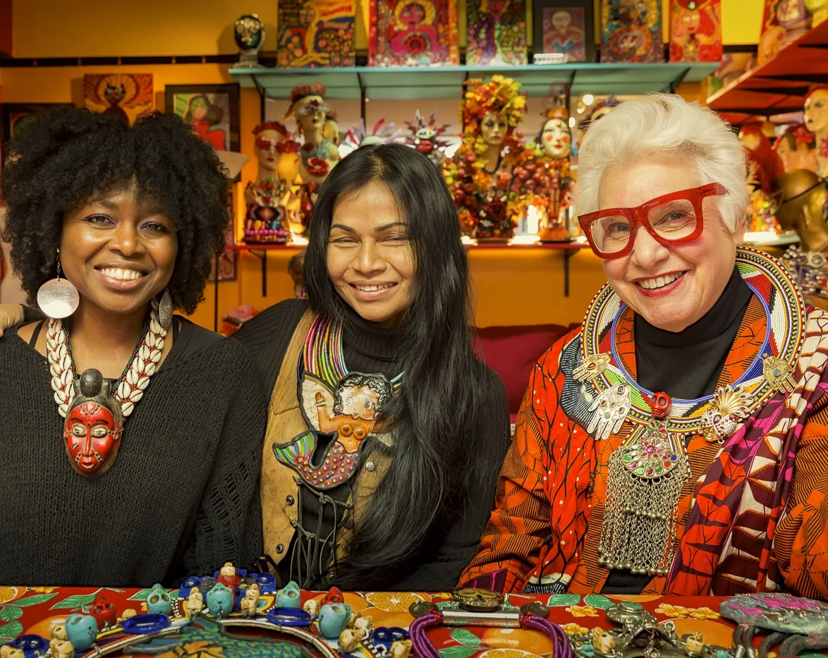 Shelita Birchett Benash, artist/curator meeting with prolific outsider artists Sue Kreitzman and Anothai Hansen at Sue's NYC studio before the opening of Out of Bounds: Freedom of Expression Exhibition December 2014. 