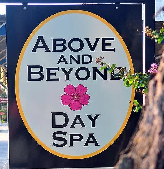 Above and Beyond Day Spa Logo