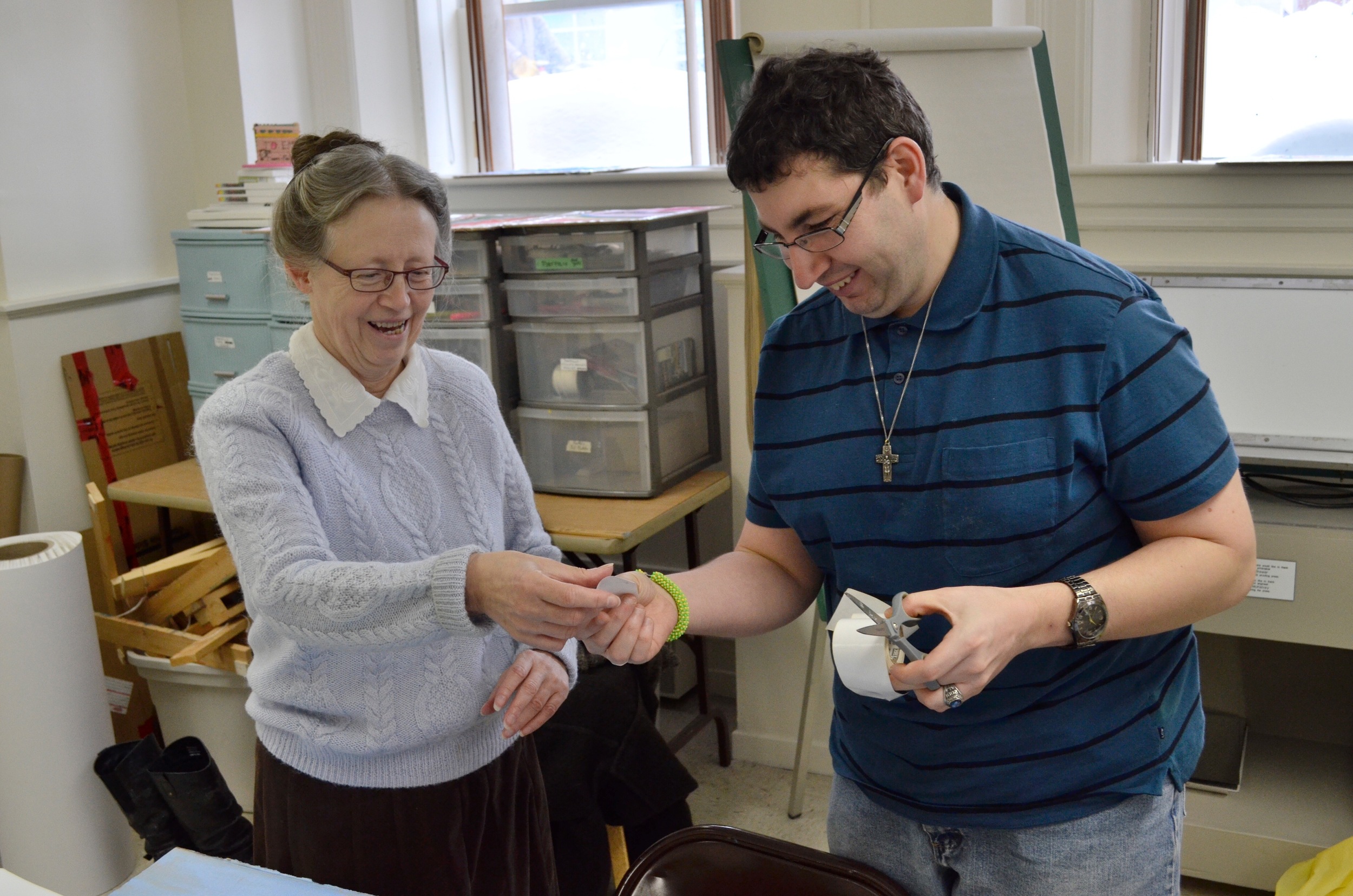 Anne and Stéphane supporting one another in preparation of Heart City