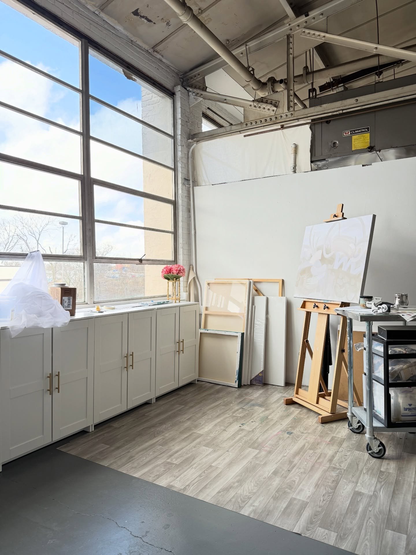 Installed the cabinet pulls. 🤗 So tickled over the light in here 

#artstudio