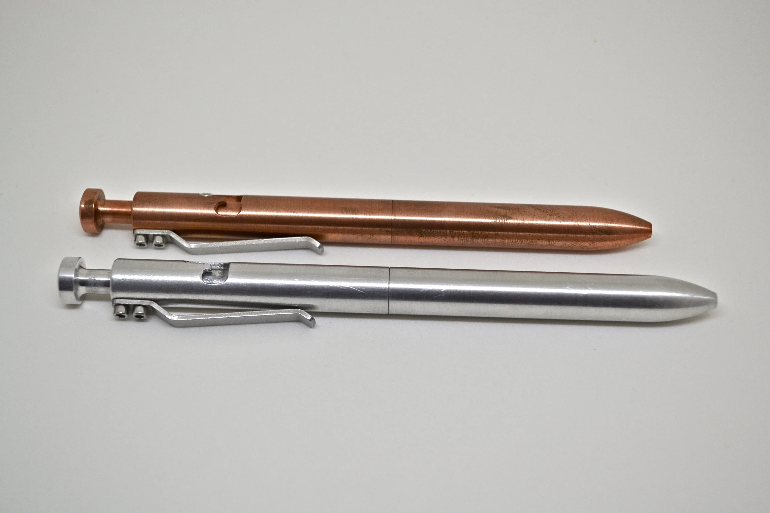 Aluminum G2 Bolt vs Copper Standard Bolt for Size Comparison