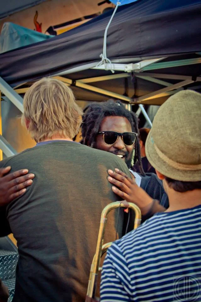 Giving a hug to Chuck from the Mad Caddies. I stole this picture from their website. Also, I think it might have been a NEXUS cover?
