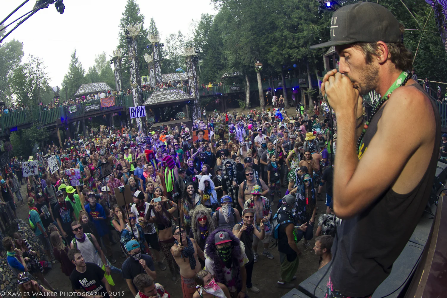Blasting the Village Stage with his dirty harmonica grooves. Photo by Xavier Photography .