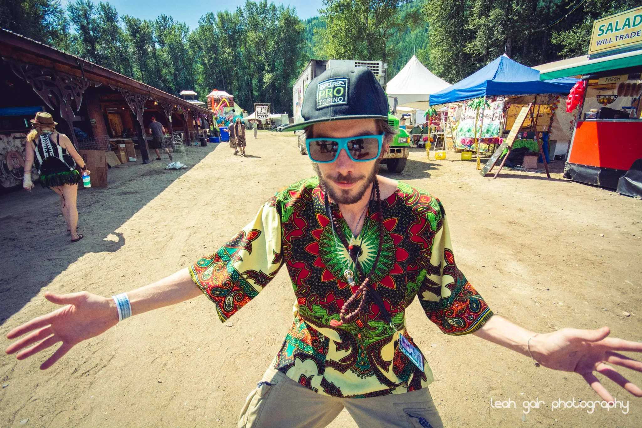 The Funkee Wadd waiting to assault people with hugs at Shambhala. Photo by Leah Gair Photo .