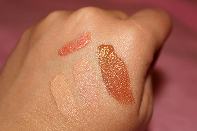 Clockwise from top left: Pearlicious Lip Gloss in "Menage," Salmon Concealer in Dark, Medium, Light. 