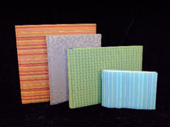 Photo albums are available in 4 sizes and range in price from $60.00 to $125.00.