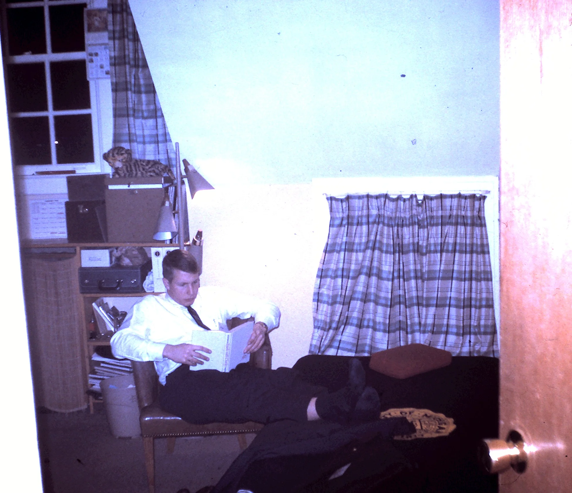 A Sigma brother (possibly John Moorhead ’63) in his room at the chapter house, 1963
