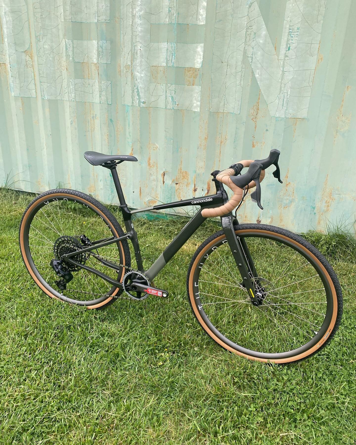 Have a dream bike? We can make it happen for you. This @ridecannondale Topstone started as a complete GX bike and finished with @sramroad mullet drivetrain, a custom @hplusson x @dtswiss wheelset, @maxxisbike tires, and @wolf_tooth_comp bar tape. Thi