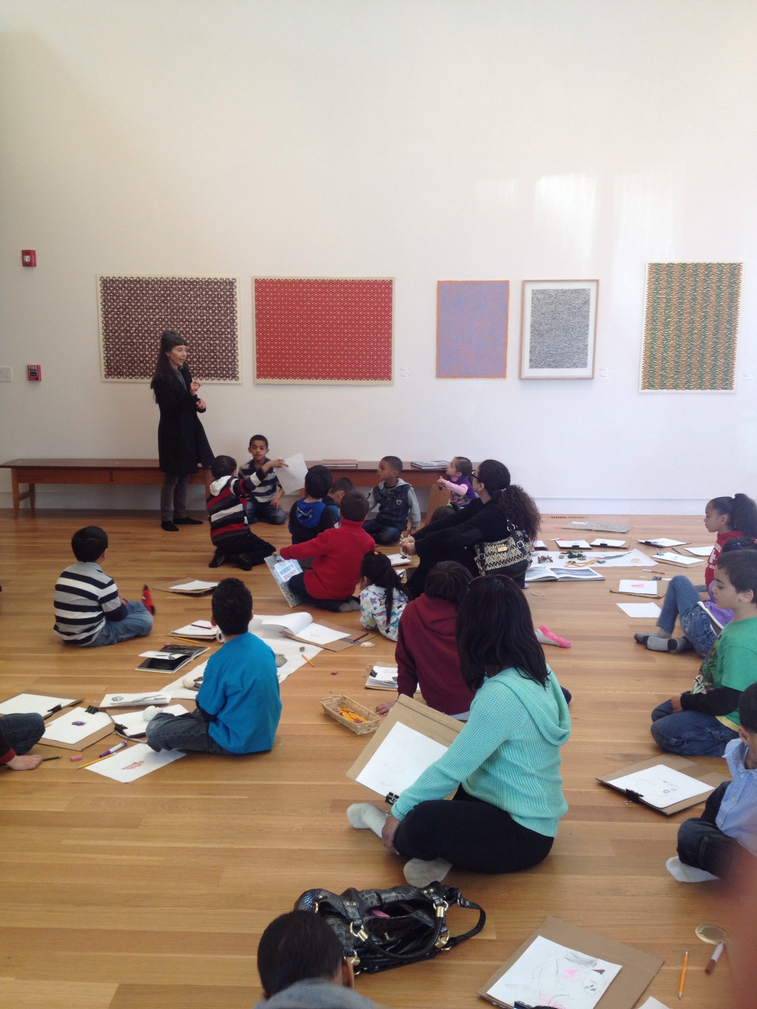 Jacqueline Ott sharing her work with students from Renaissance School, located in New Bedford, MA. -at Dedee Shattuck Gallery 