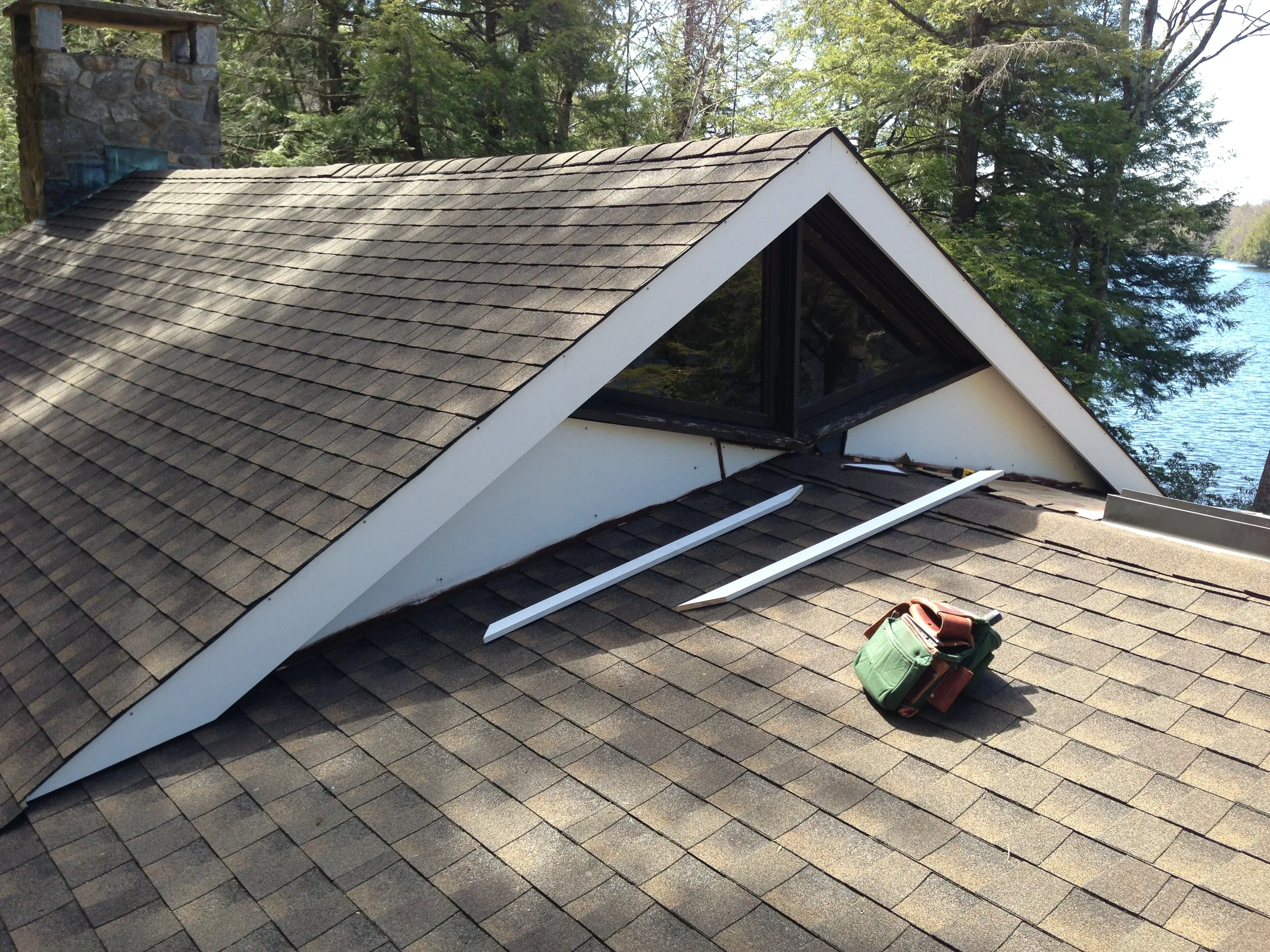 New Roof Shingles, Trim And Siding Panels (During)