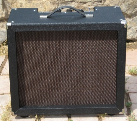 This Mike Matthews Freedom Amp came in. The Cab was shot---and the caps were bad. I built a new cab and re-capped and voilà better than new!
