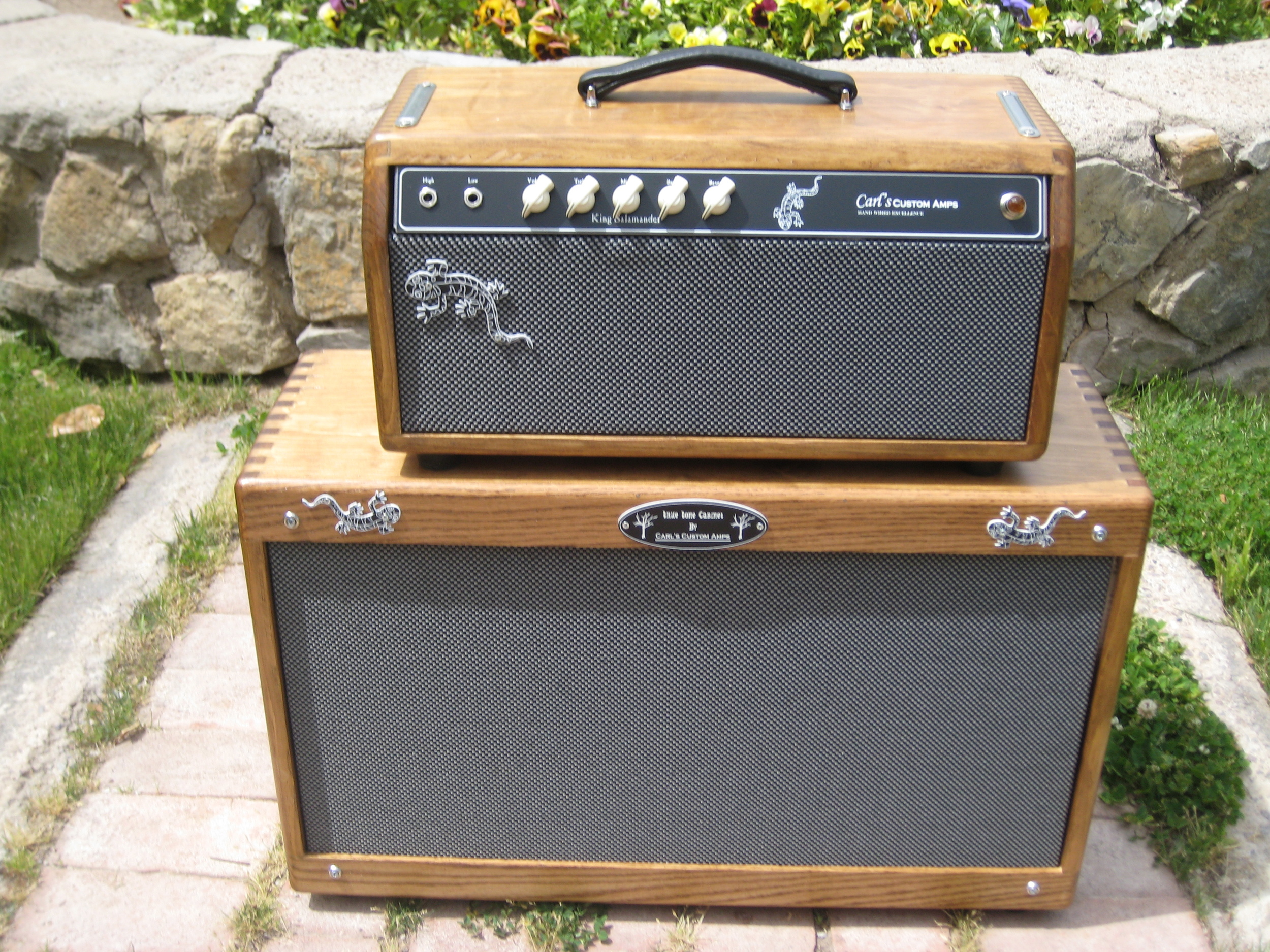 This custom amp was built for the band King Salamander. Unique improved Fender Blackface circuit with reverb. The cab has a pair of Weber Speakers
