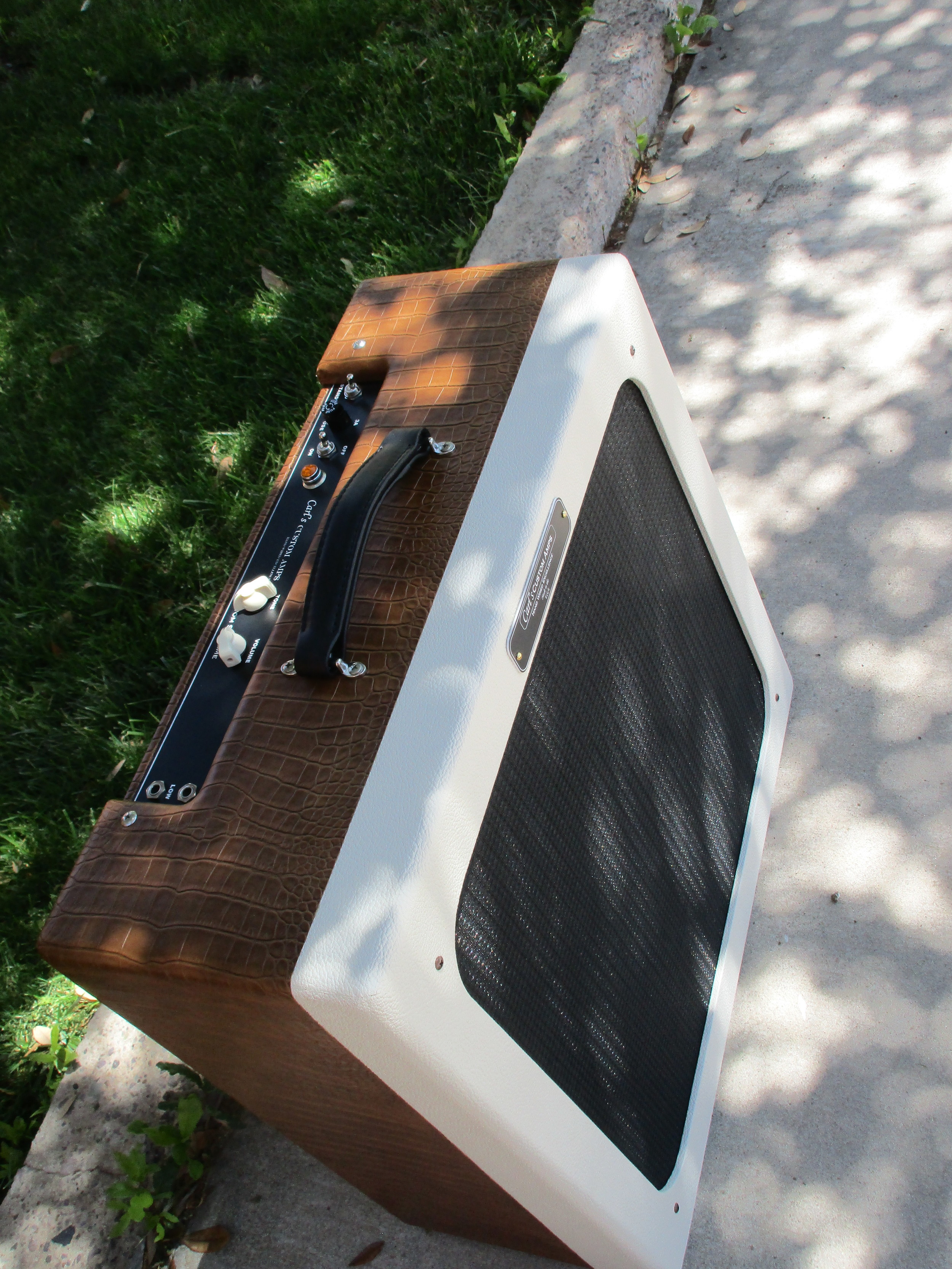 This was a really cool amp! It's a Supro Supreme Style circuit with octal preamp tubes but with the ability to use 6L6 and 6V6 tubes, a on board power attenuator, a Weber 15" 15F150-O.