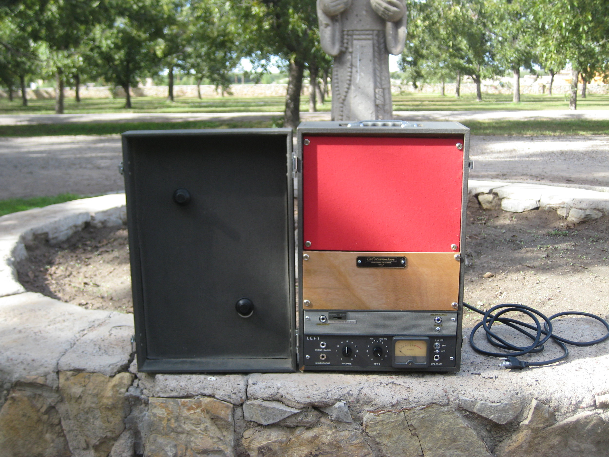 I did this one a while back . This little amp was built out of and old Reel to Reel tape recorder. The Tape player did so I converted the amp over to a 5 Watt Tweed Princeton with an El-84 and added an 8 inch speaker. The Meter lights up and moves.
