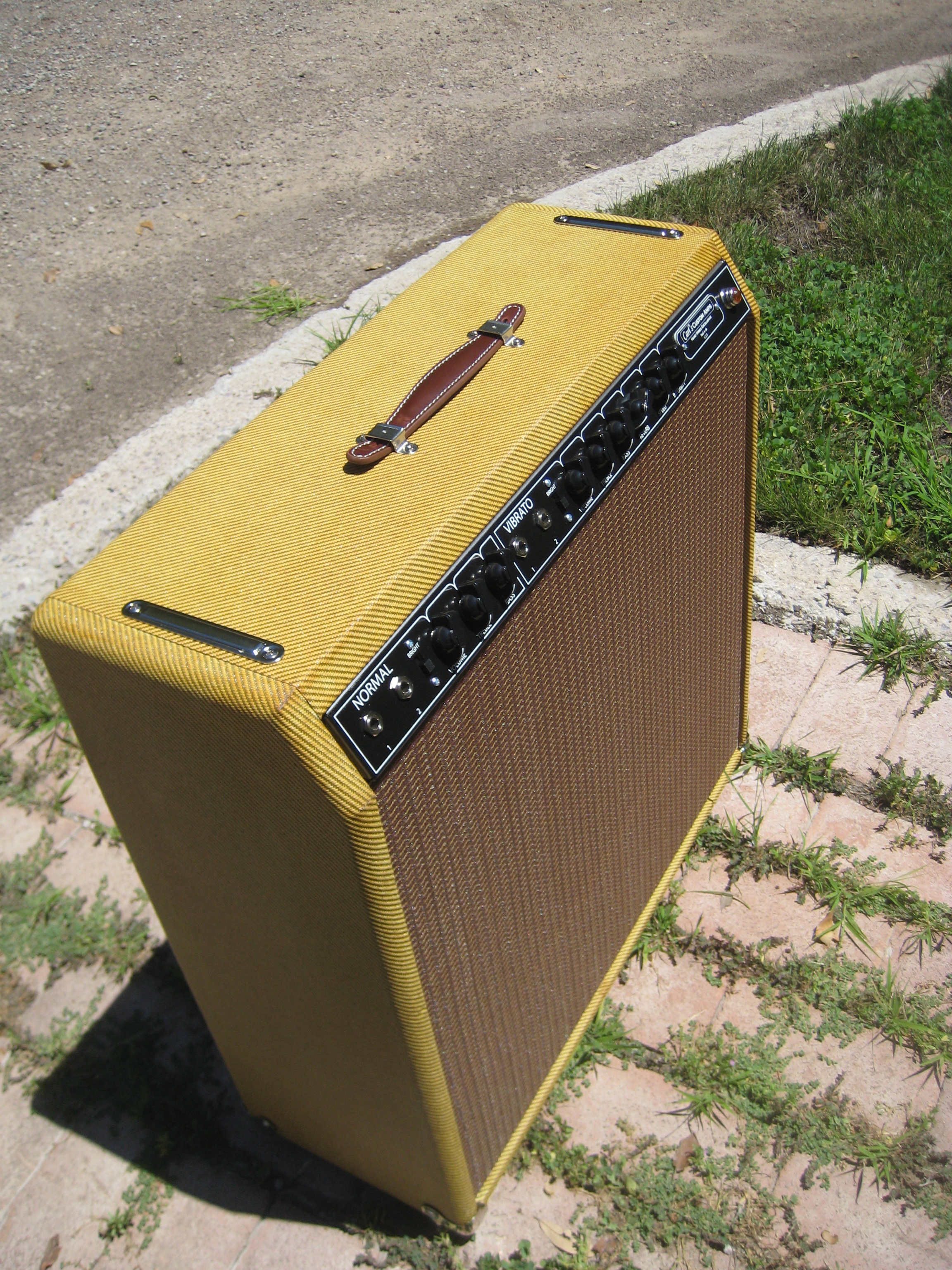 I built this one a while back. It's Blackface Vibroverb in Tweed! I used a bias wiggle trem on it instead of the opto-trem. The trem works for both channels!! It's got a Weber Alnico 15" Speaker. Sweet Cleans and deep lows!