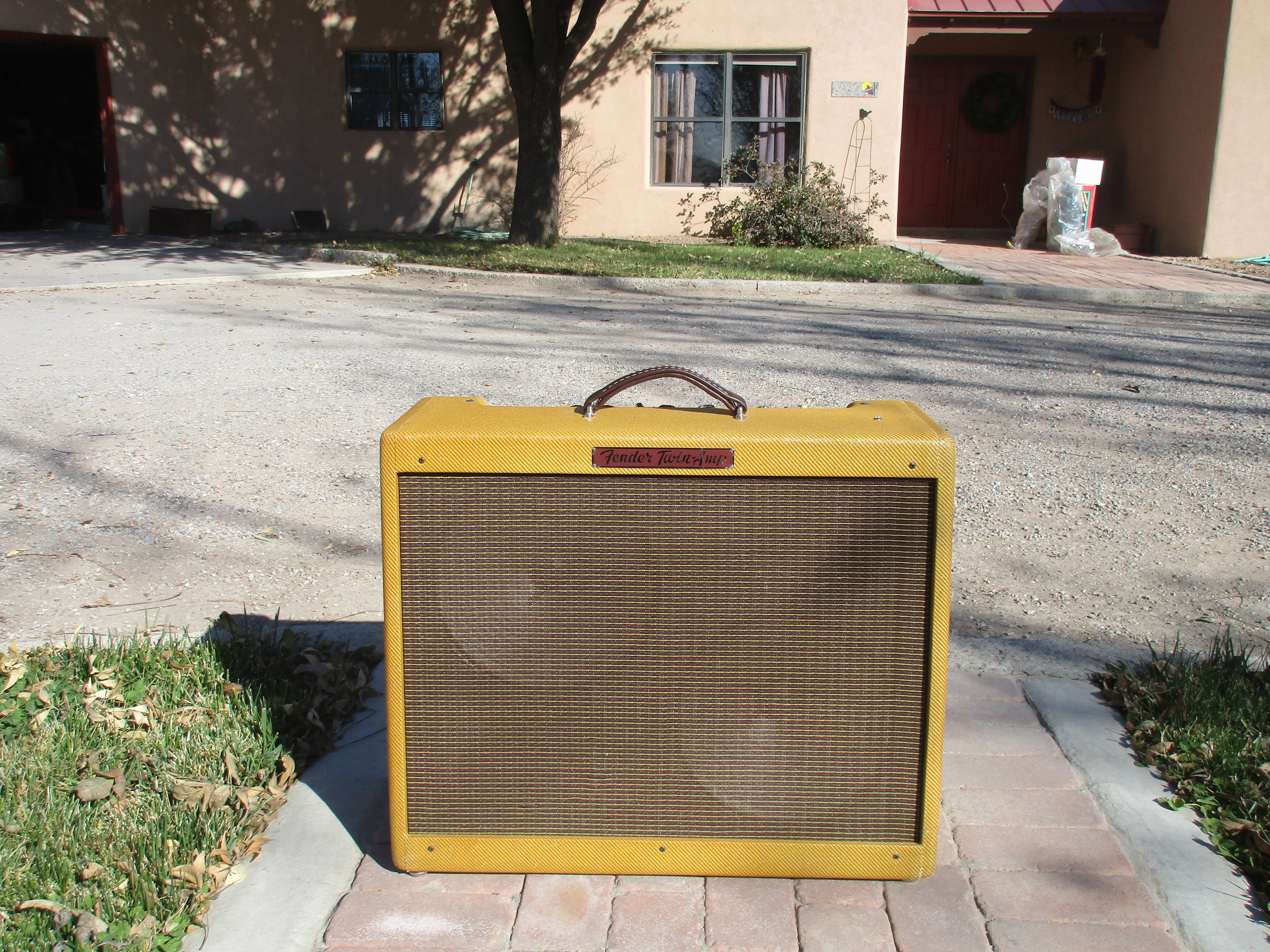 Fender Custom Shop 57' Low Power Twin that we modded. The circuit has lots of flaws and cheap filter cops that really keep it from sounding good. Fender almost verbatim copied the old schematic without solving all the little problems good techs have been solving for years with these. In addition the voltages were way too high making it really harsh. With some work that map now sounds just as it should: warm, responsive and killer!