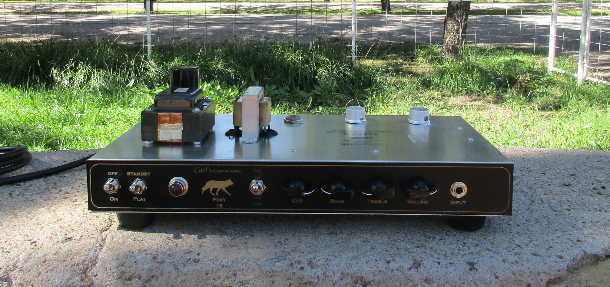 I called this one the Foxy 15. This chassis uses a slightly modified Vox AC-30 Top Boost Circuit, that's 15 watts and bit smoother. It has a Blues Junior transformer set. It's also got switch that shifts between a tube and solid state rectifier sound which gives you a bit more compression with the amp turned up. Chimey and crunchy!