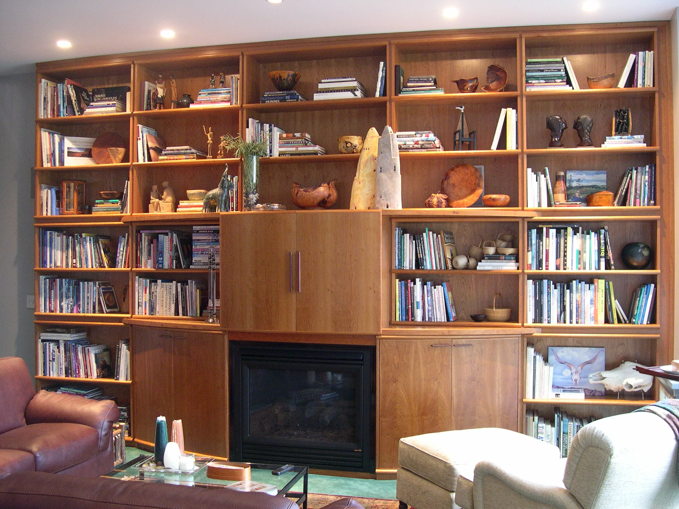Cherry bookcase and fireplace