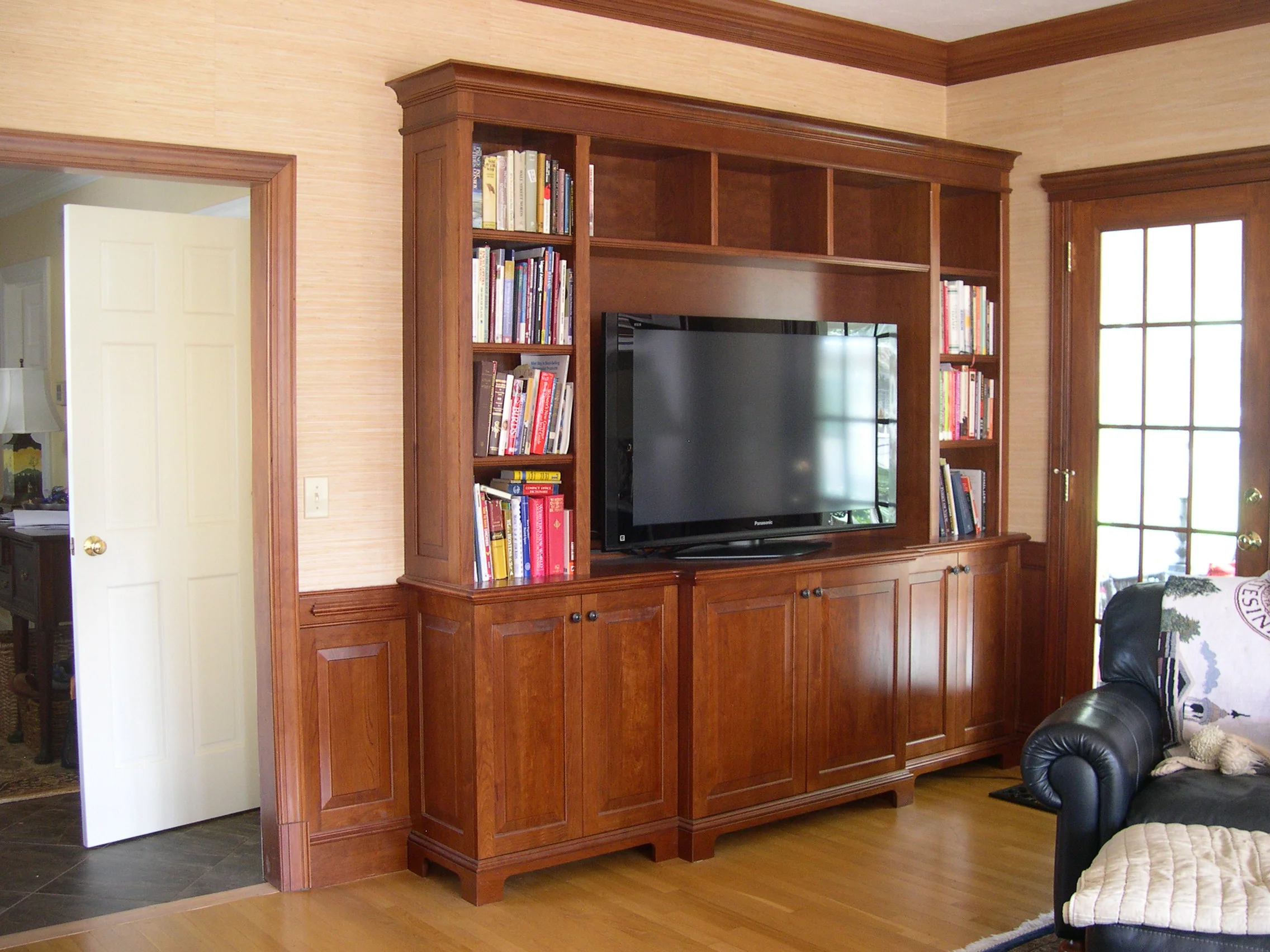Cherry wall unit built to match existing wainscoating