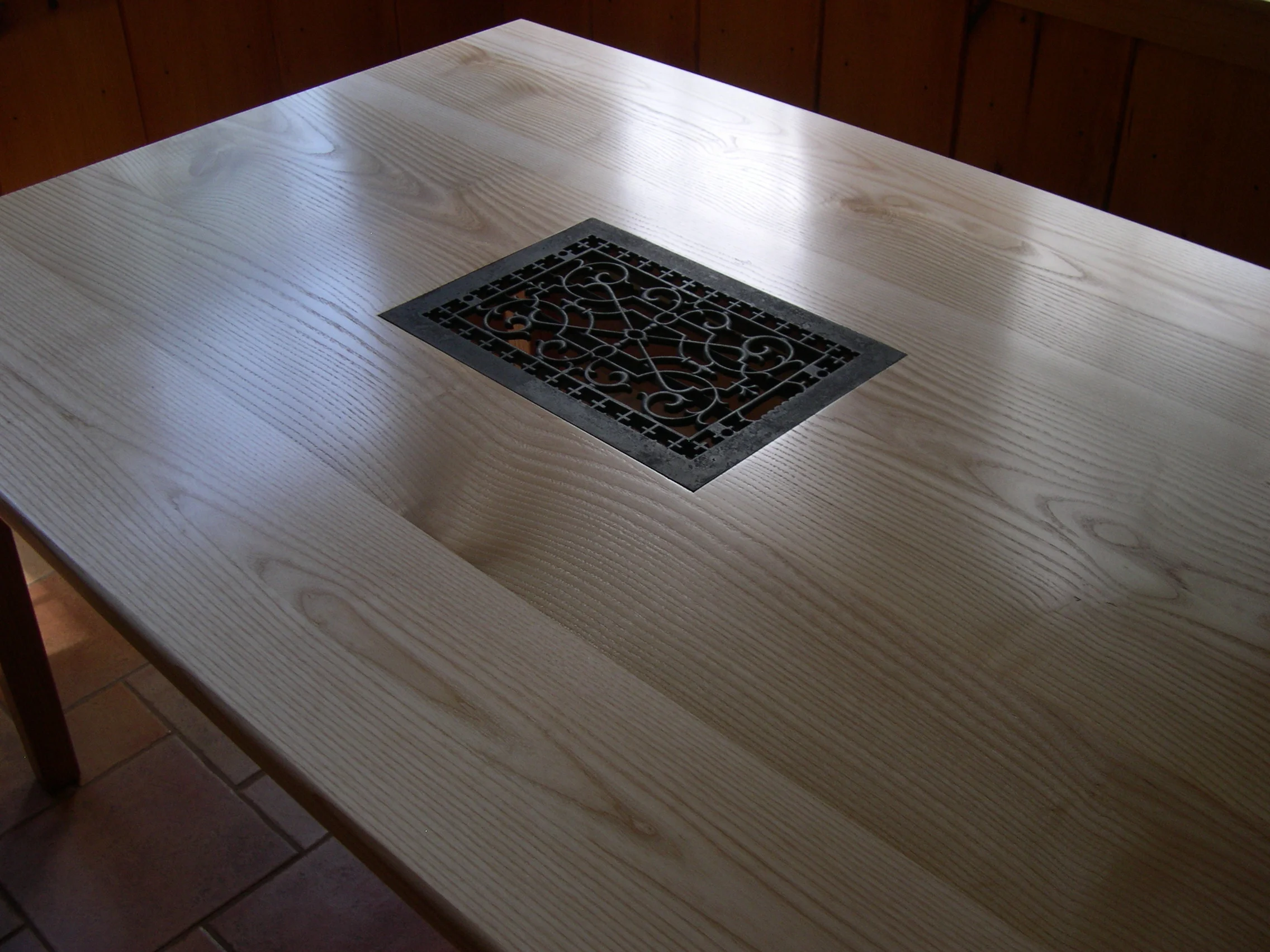 Ash kitchen table with iron trivet