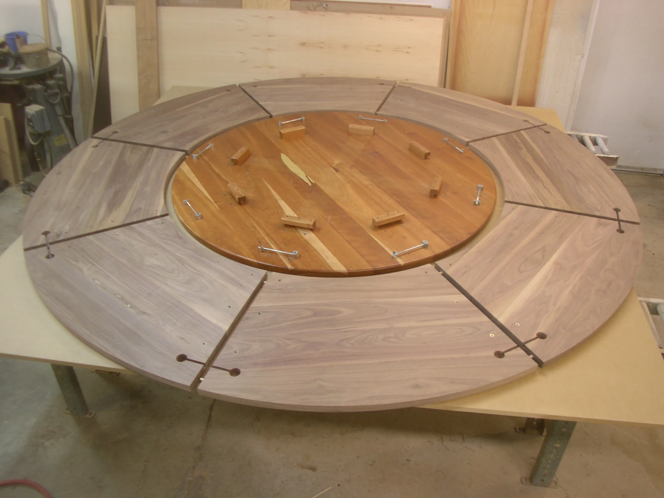 9' Diameter walnut table - Construction detail of underside in shop