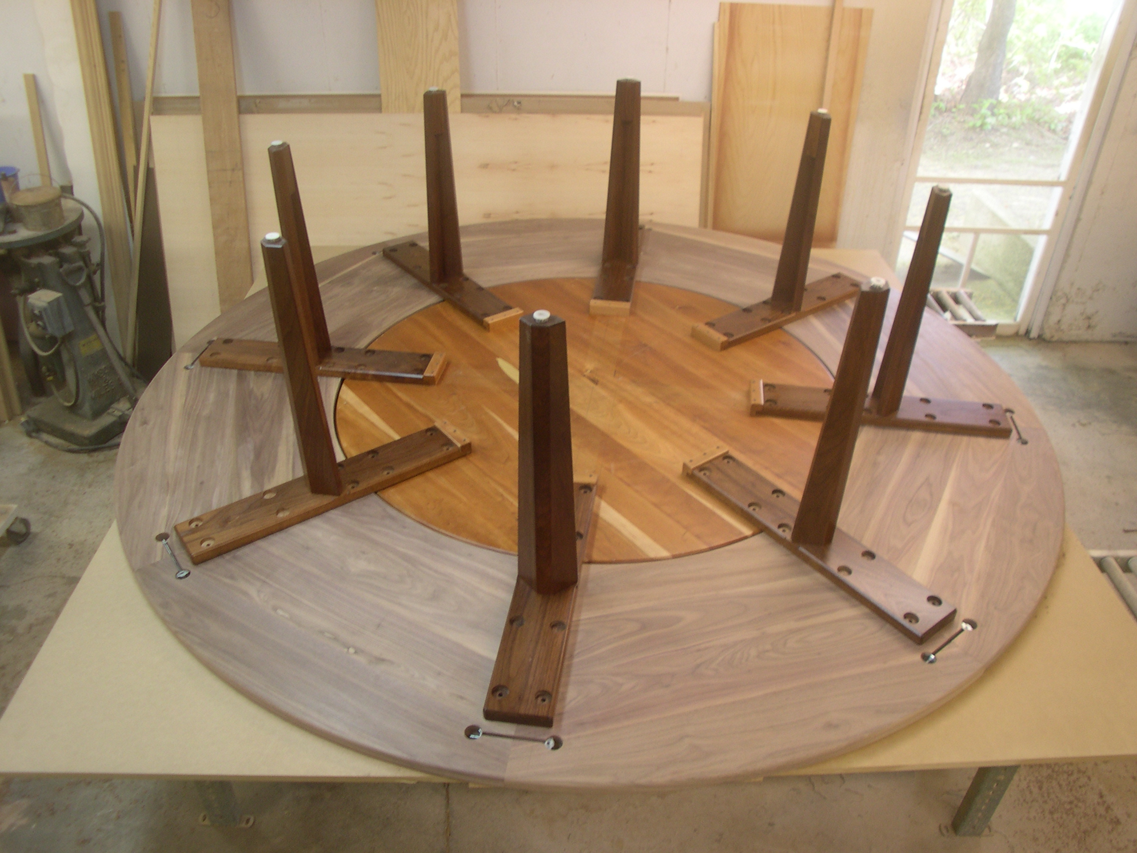 9' Diameter walnut table - Construction detail of underside in shop