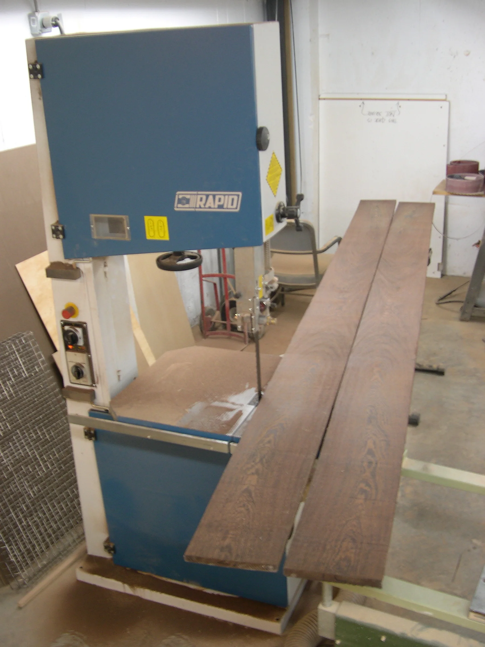 African wedge mantle on stone fireplace - Resawing 11' wedge board