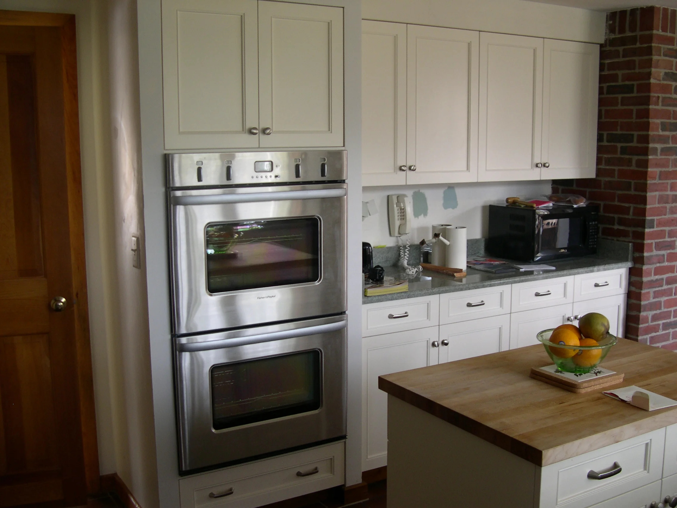 Transitional kitchen with built-ins - Oven wall