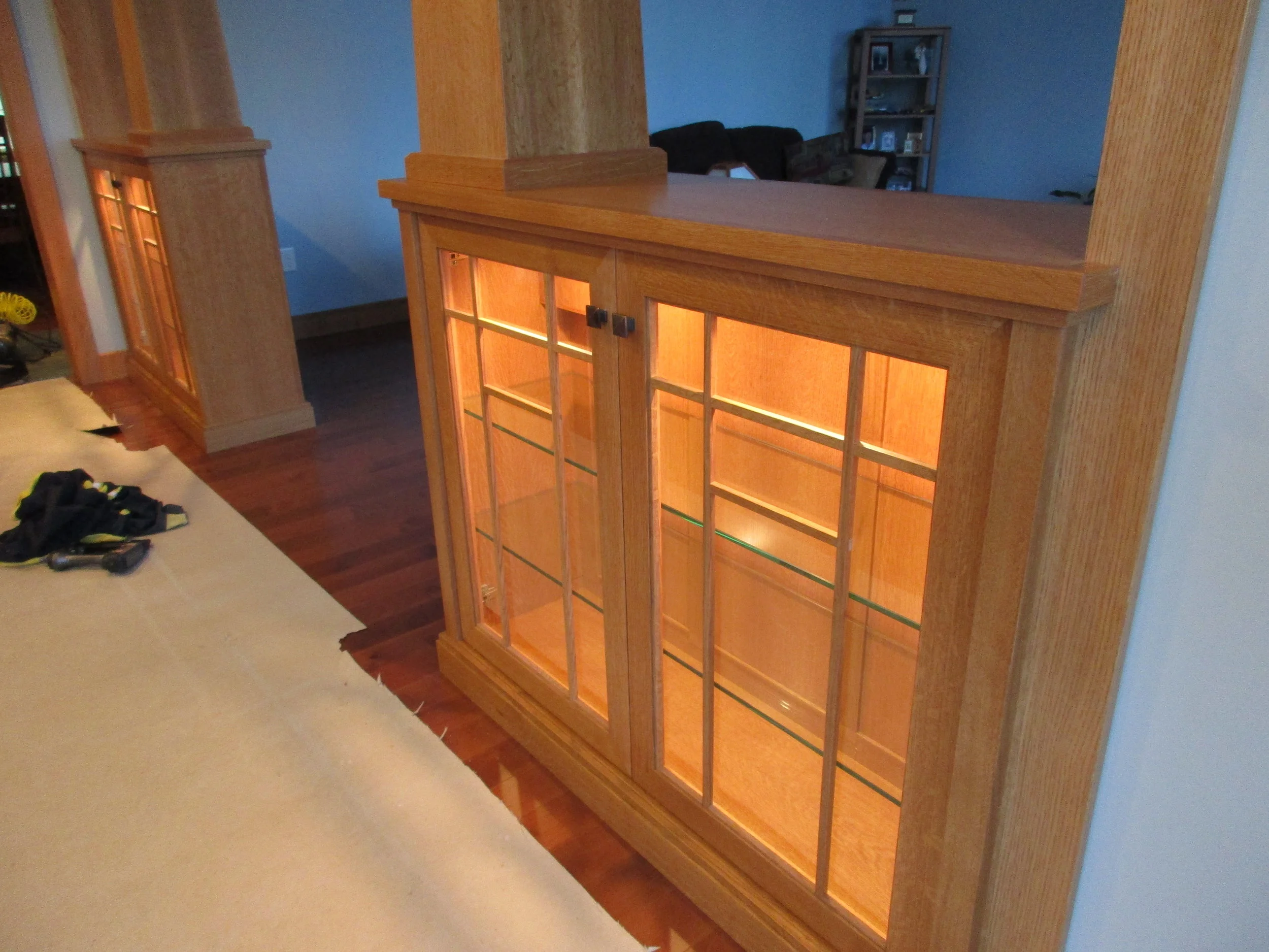 Mission style quarter-sawn oak portal from kitchen to living room