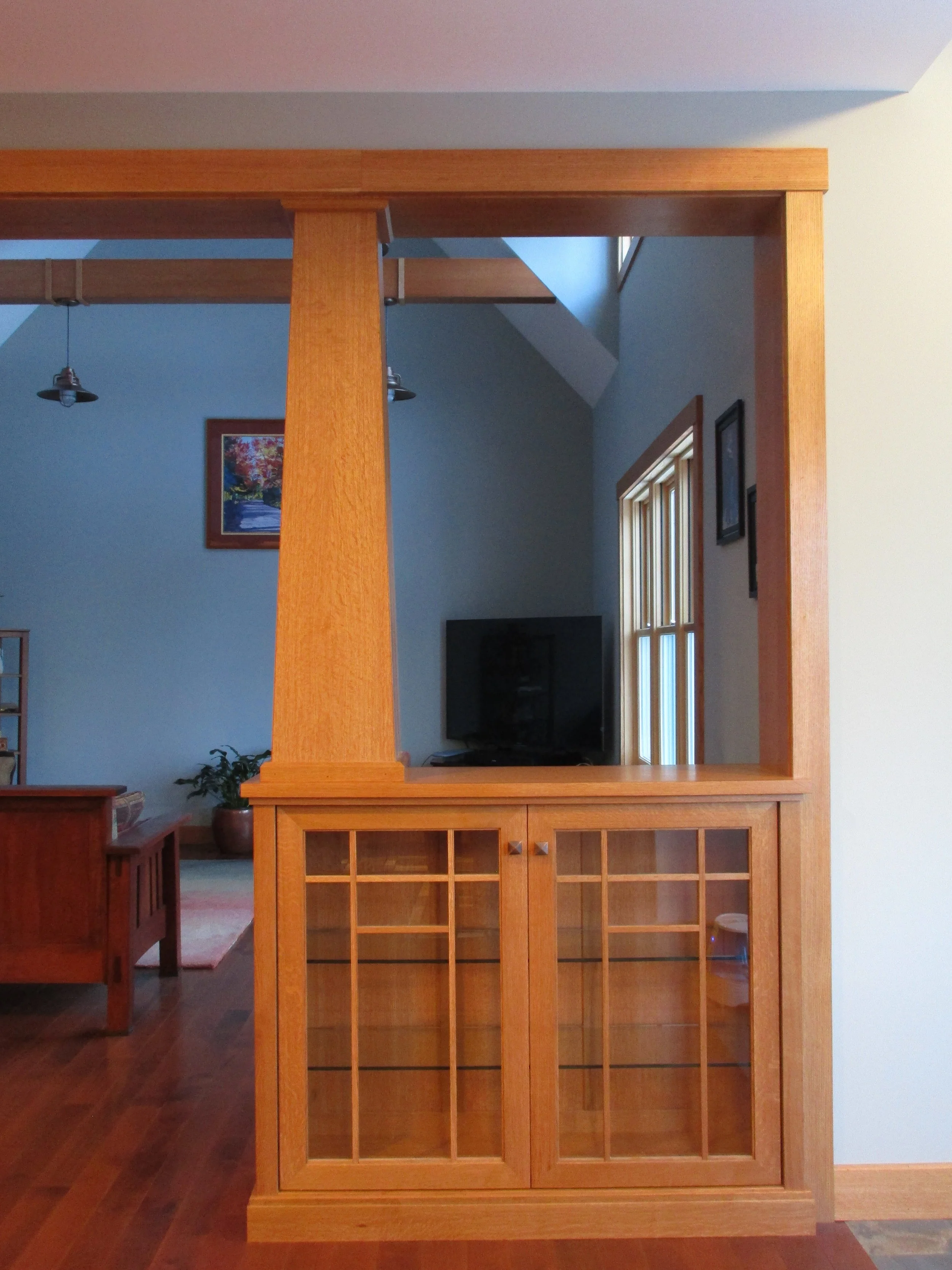 Mission style quarter-sawn oak portal from kitchen to living room