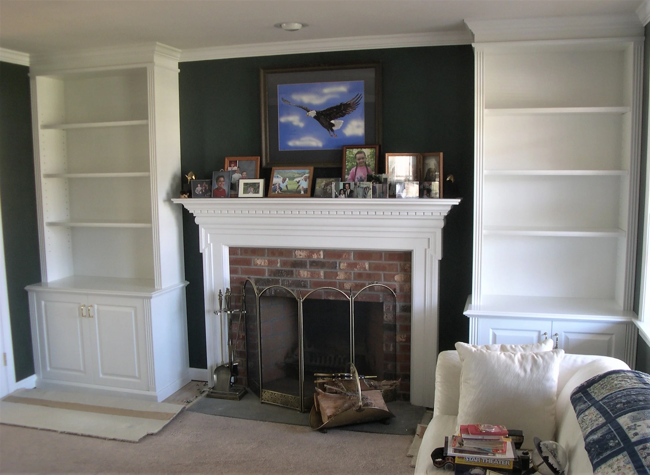 Decorative mantle with bookcase units