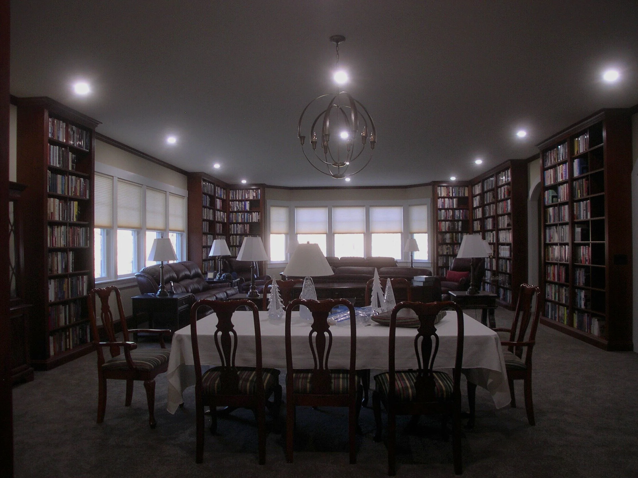  Living room library bookcases, stained cherry with clear lacquer finish - dining area  